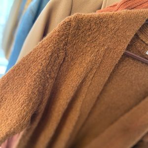 Duster. Rust colour, beautiful for fall.